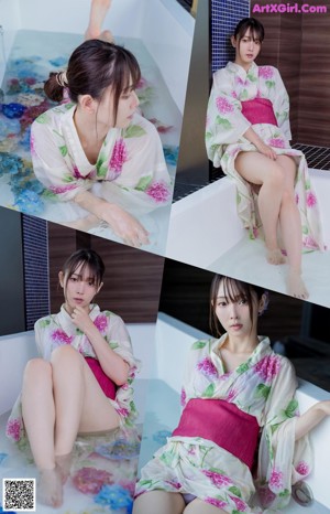 A woman sitting in a bathtub filled with water and flowers.