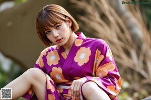 A woman in a green sweater and white skirt posing on a rock.