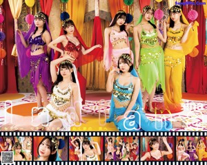 A group of women dressed in brightly colored outfits posing for a picture.